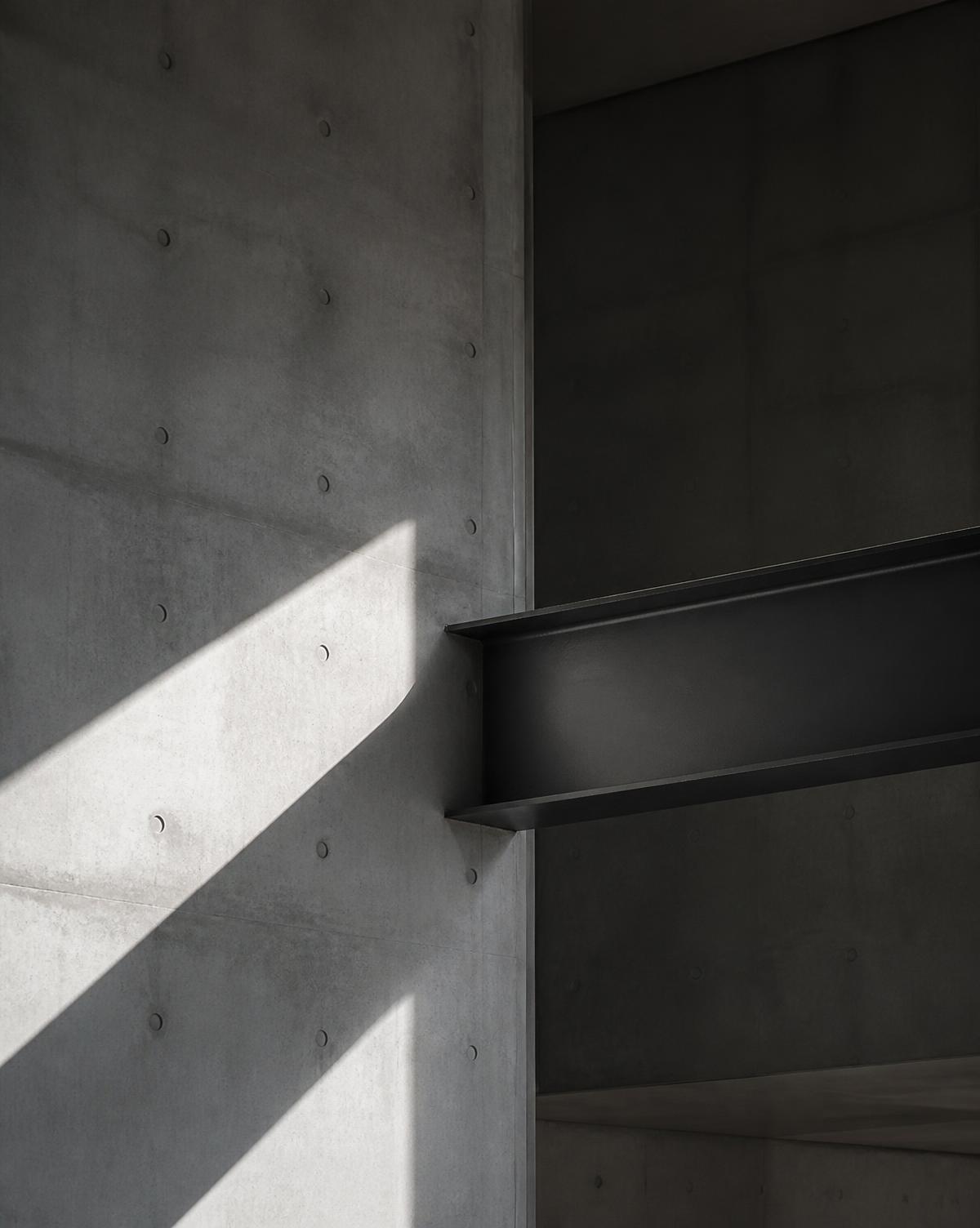 Concrete wall and steel beam architectural detail